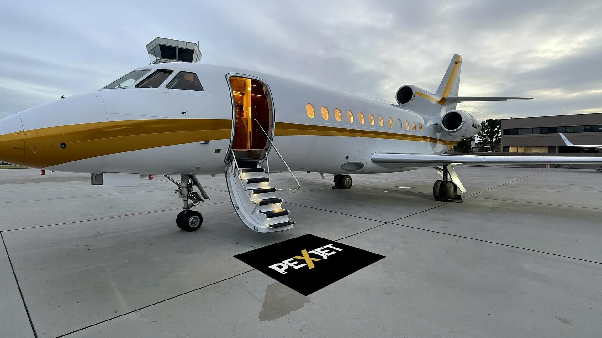 Private jet flying over clouds